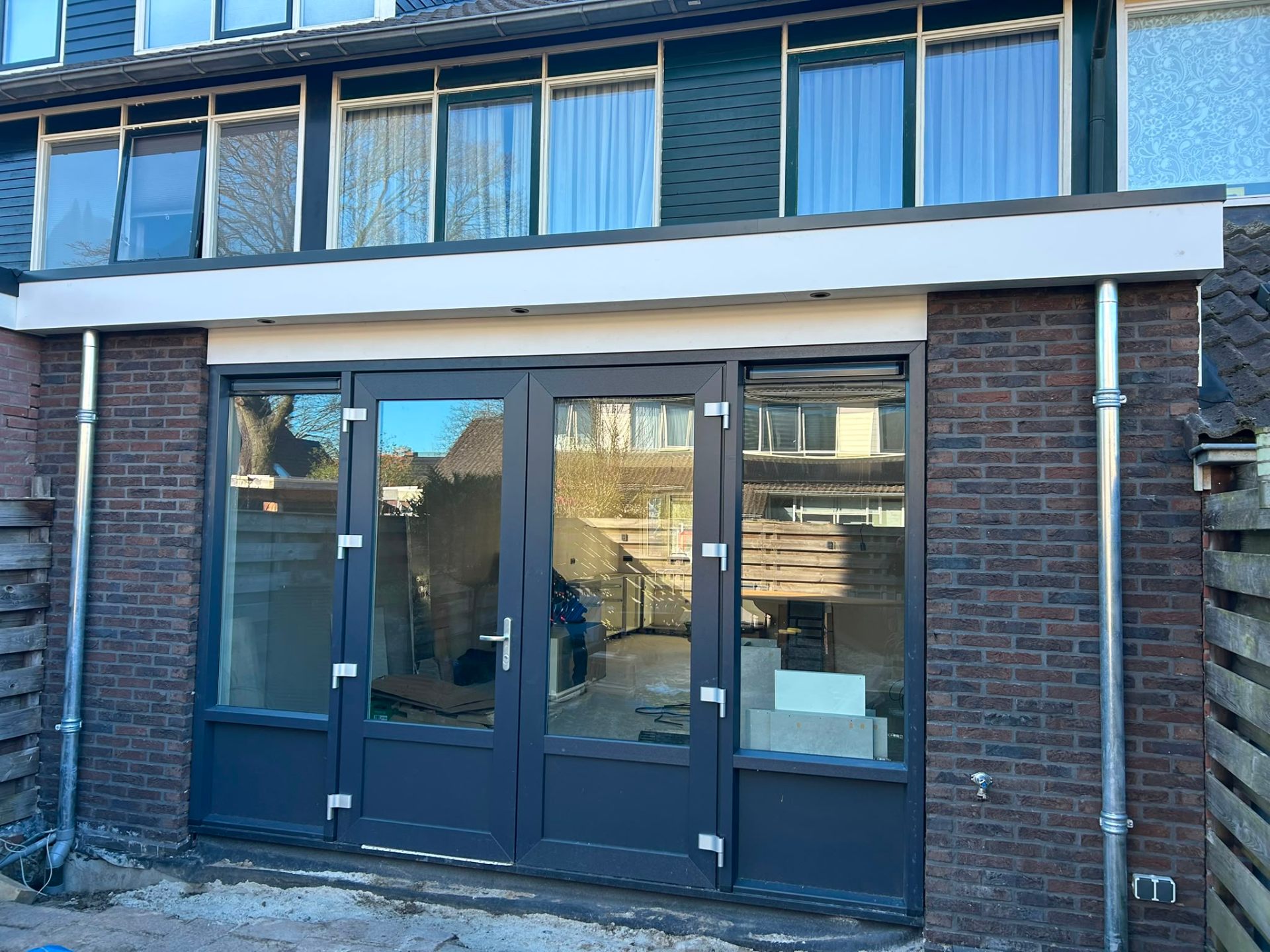 Uitbouw Baalder — eindresultaat met grote pui